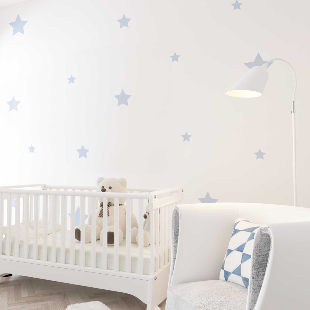 Autocollants muraux en vinyle en formes d'étoiles de couleur bleues.