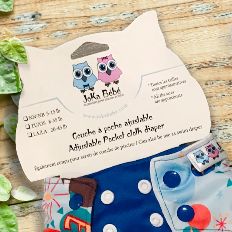 Graphisme pour l'emballage de couche lavable pour l'entreprise Joka bébé. Avec die cut en forme de tête de hiboux.